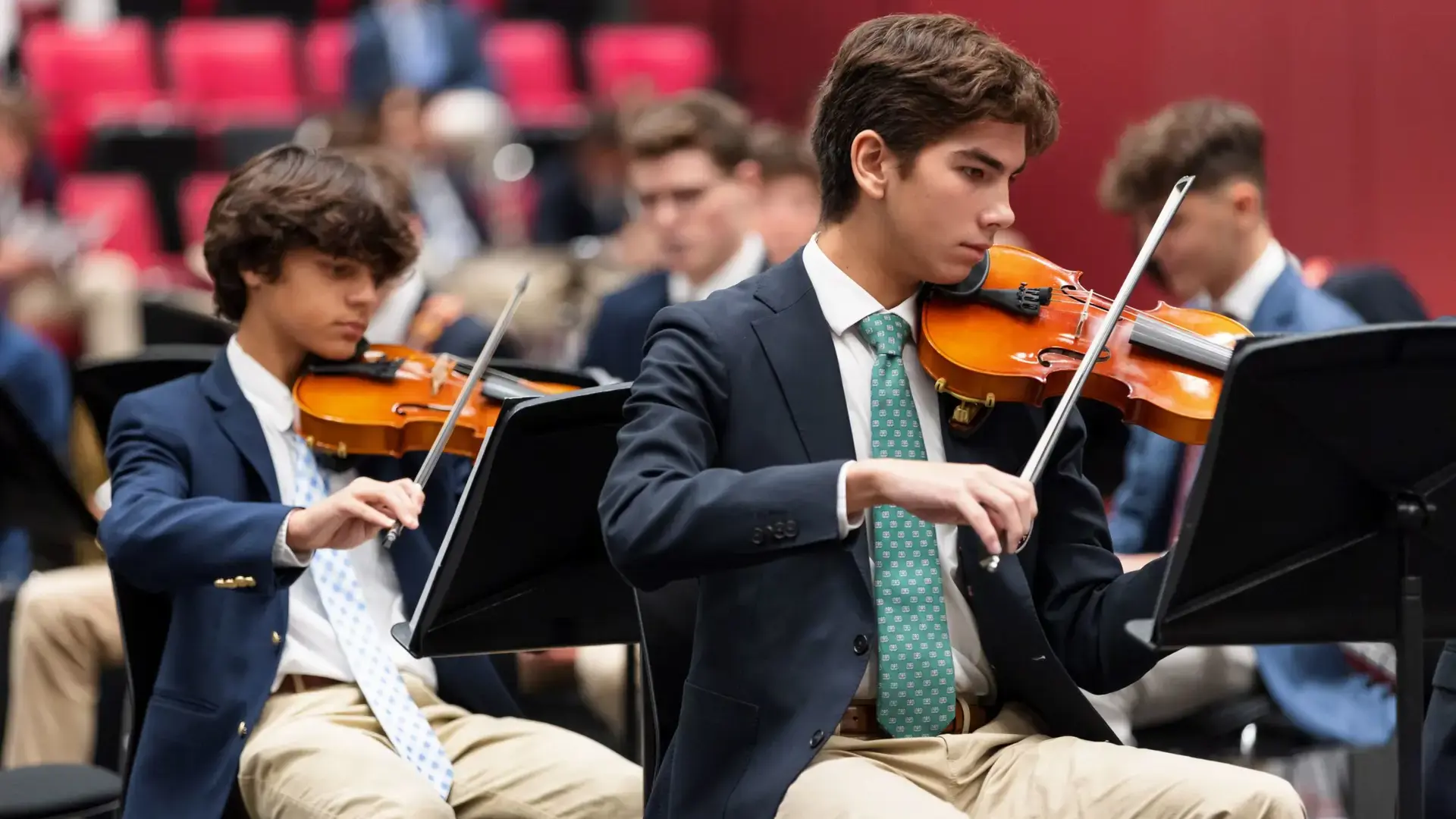 Students playing violins