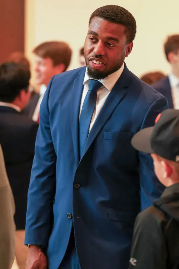 Staff talking at event