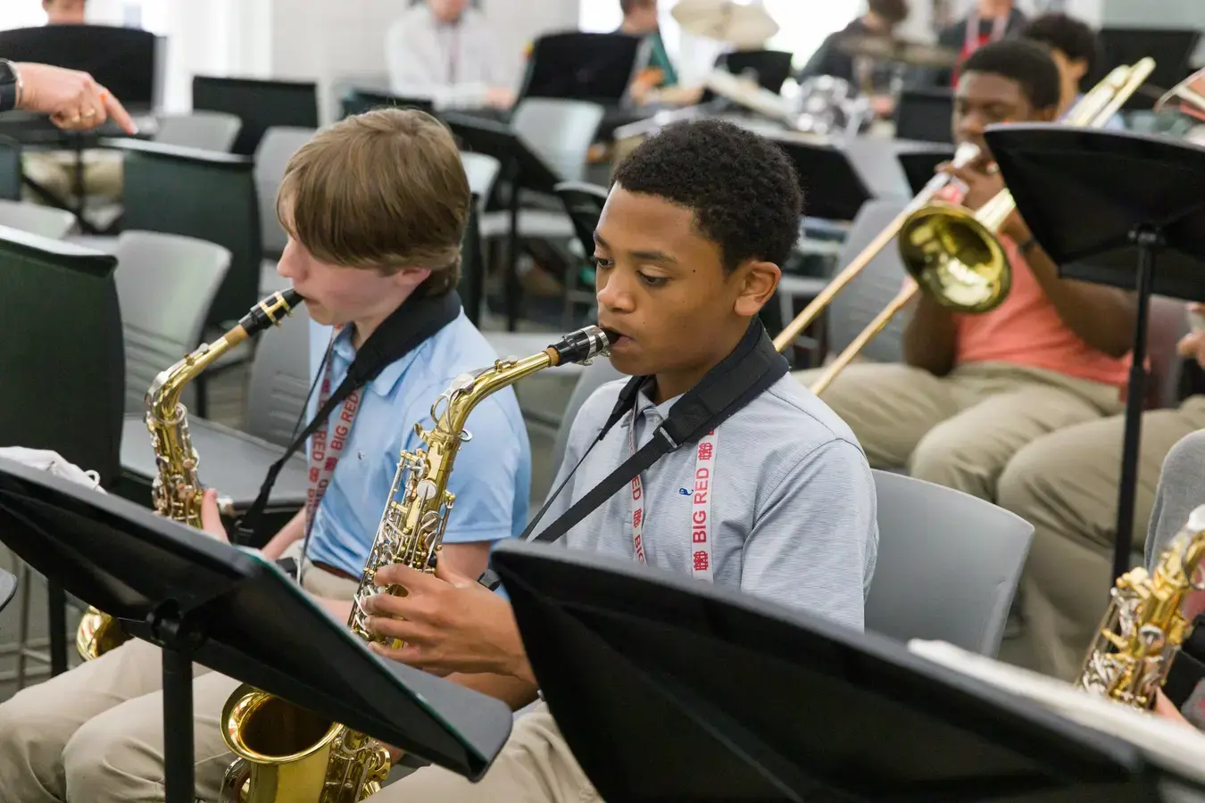 Student rehearsing with band