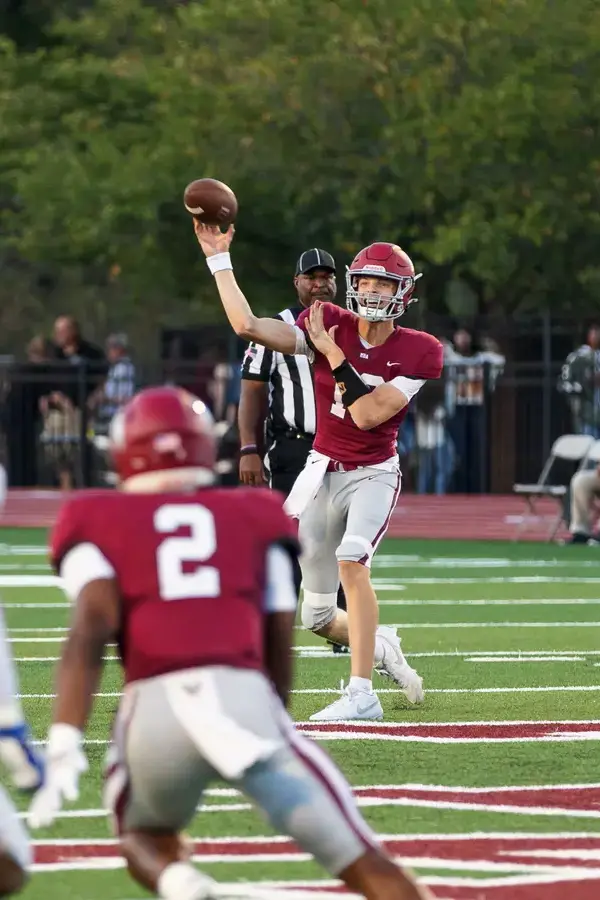Football players working together
