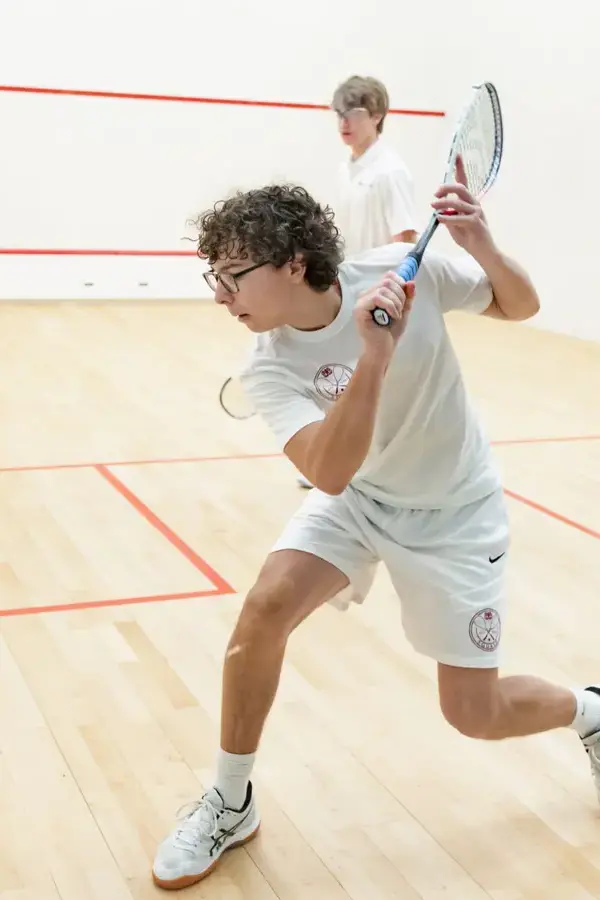 Squash player in court