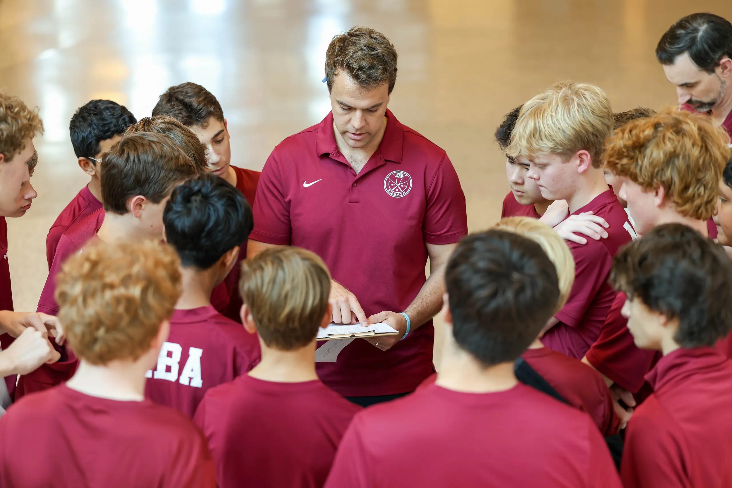 Sports teacher with students