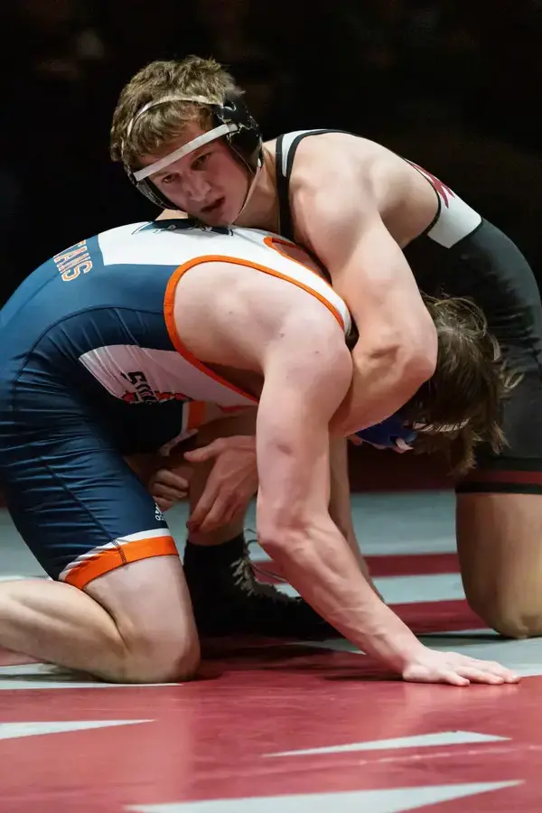 Two students wrestling